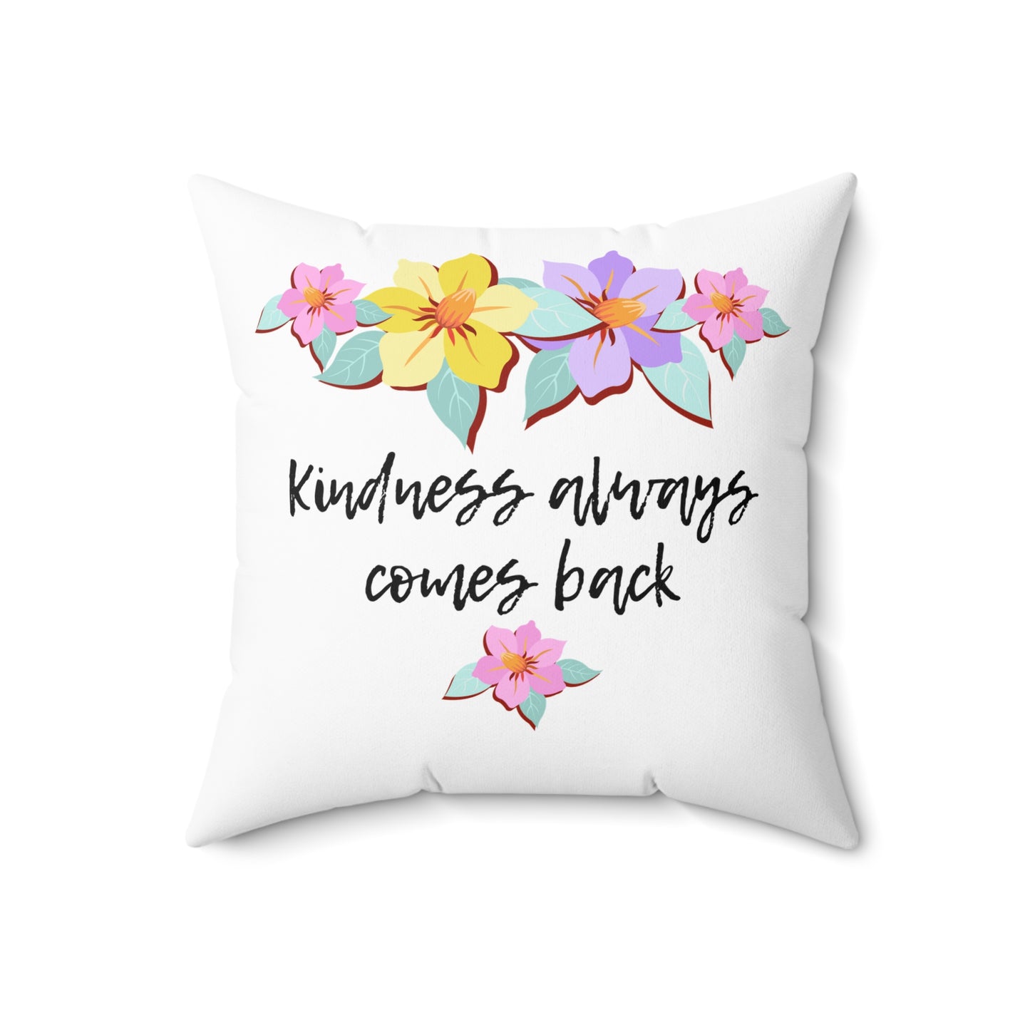 Almohada motivacional blanca con motivo de flores y cita inspiradora "La bondad siempre vuelve"