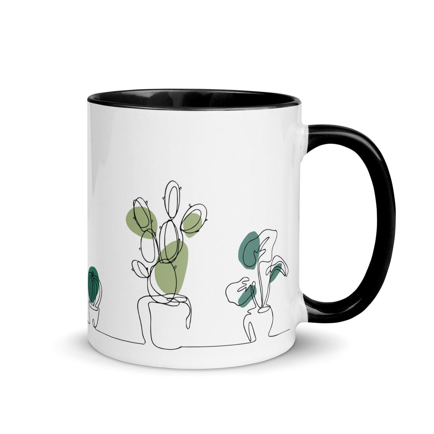 Taza de café con plantas y cactus del desierto