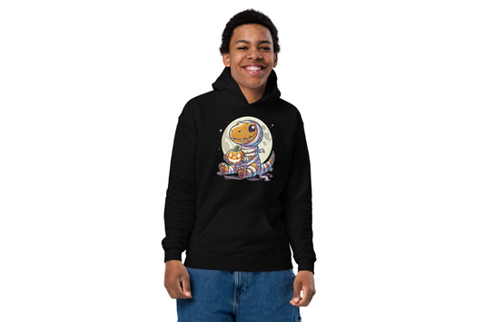 Black halloween hoodie featuring a cute cartoon dinosaur dressed as a mummy, holding a jack o lantern.