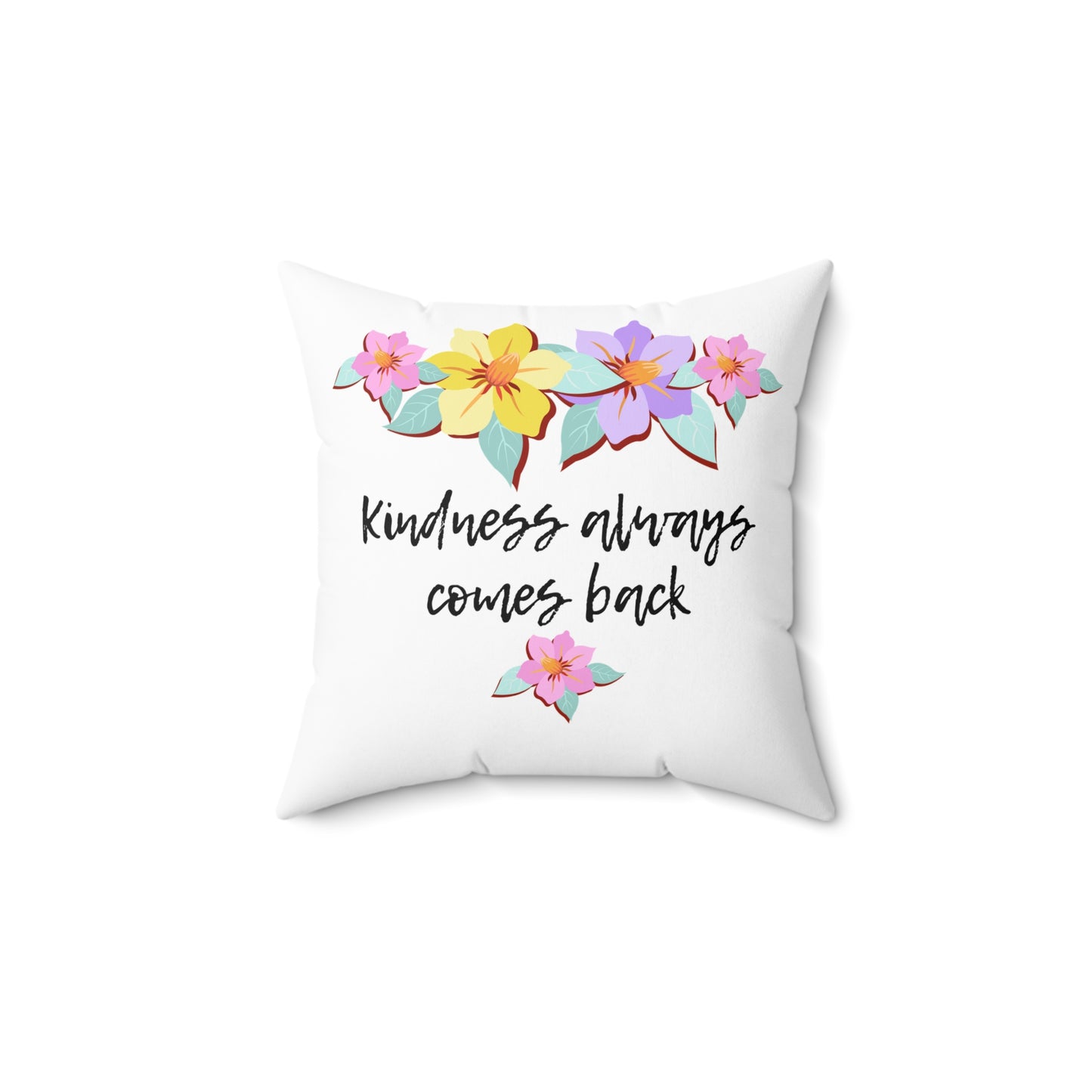 Almohada motivacional blanca con motivo de flores y cita inspiradora "La bondad siempre vuelve"