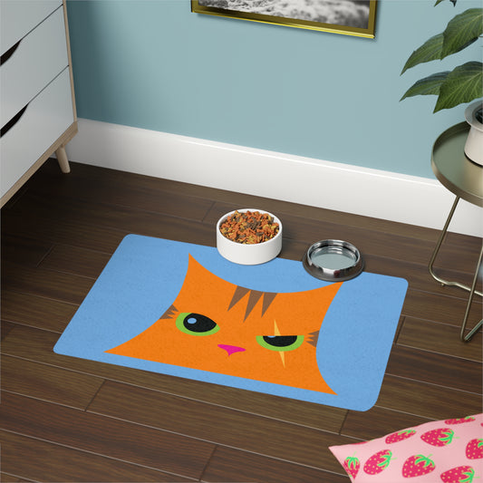 Alfombrilla para comida para mascotas con cara de gato perfecta sobre azul