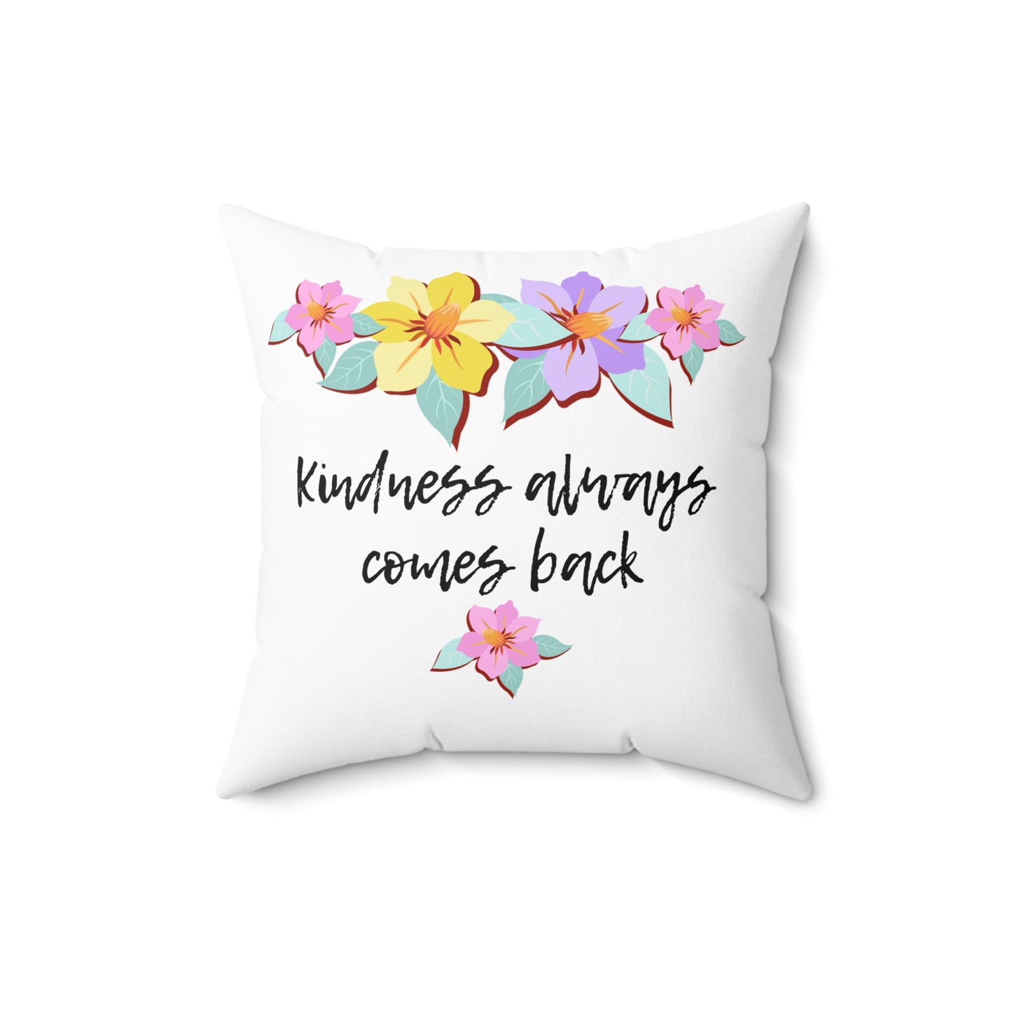 Almohada motivacional blanca con motivo de flores y cita inspiradora "La bondad siempre vuelve"