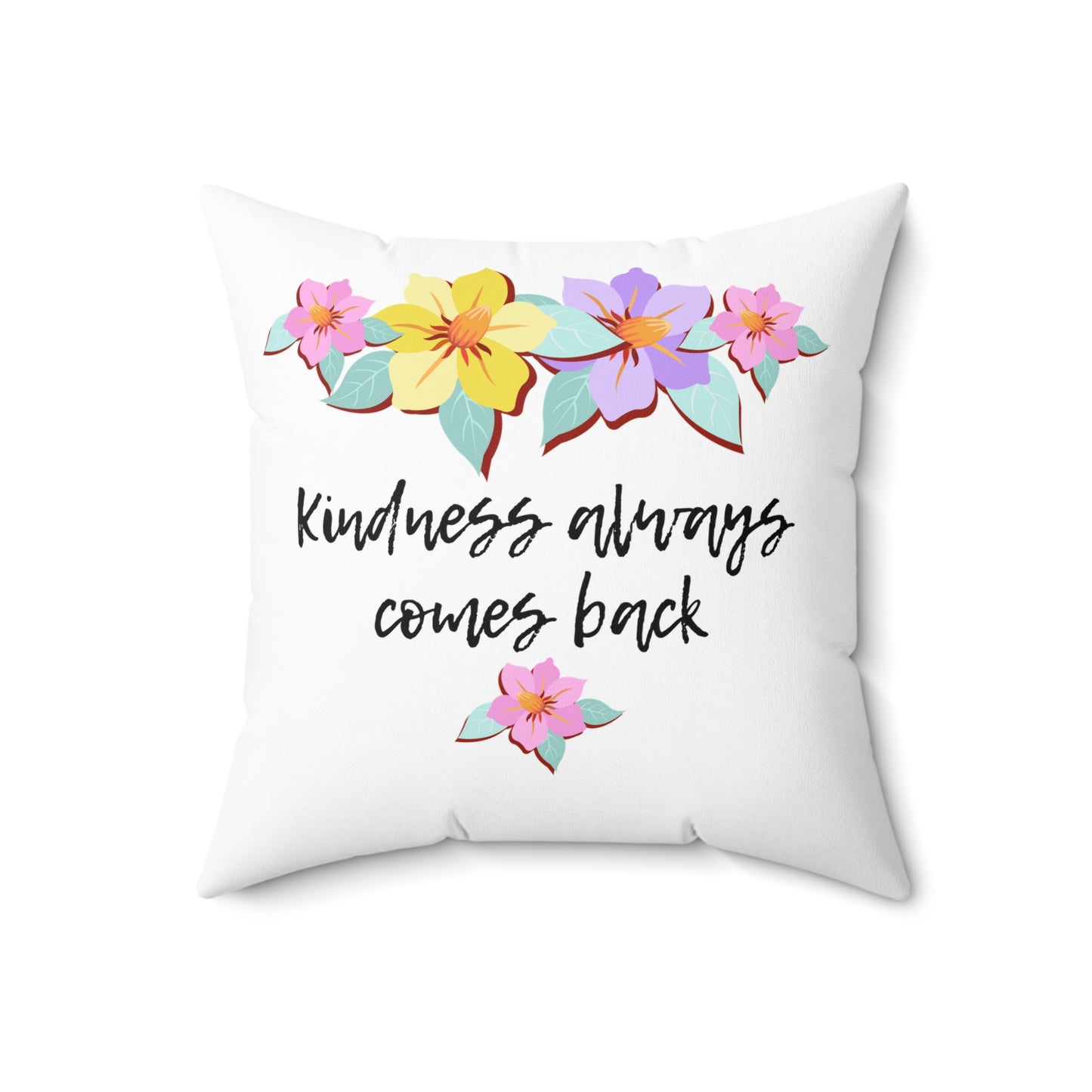 Almohada motivacional blanca con motivo de flores y cita inspiradora "La bondad siempre vuelve"