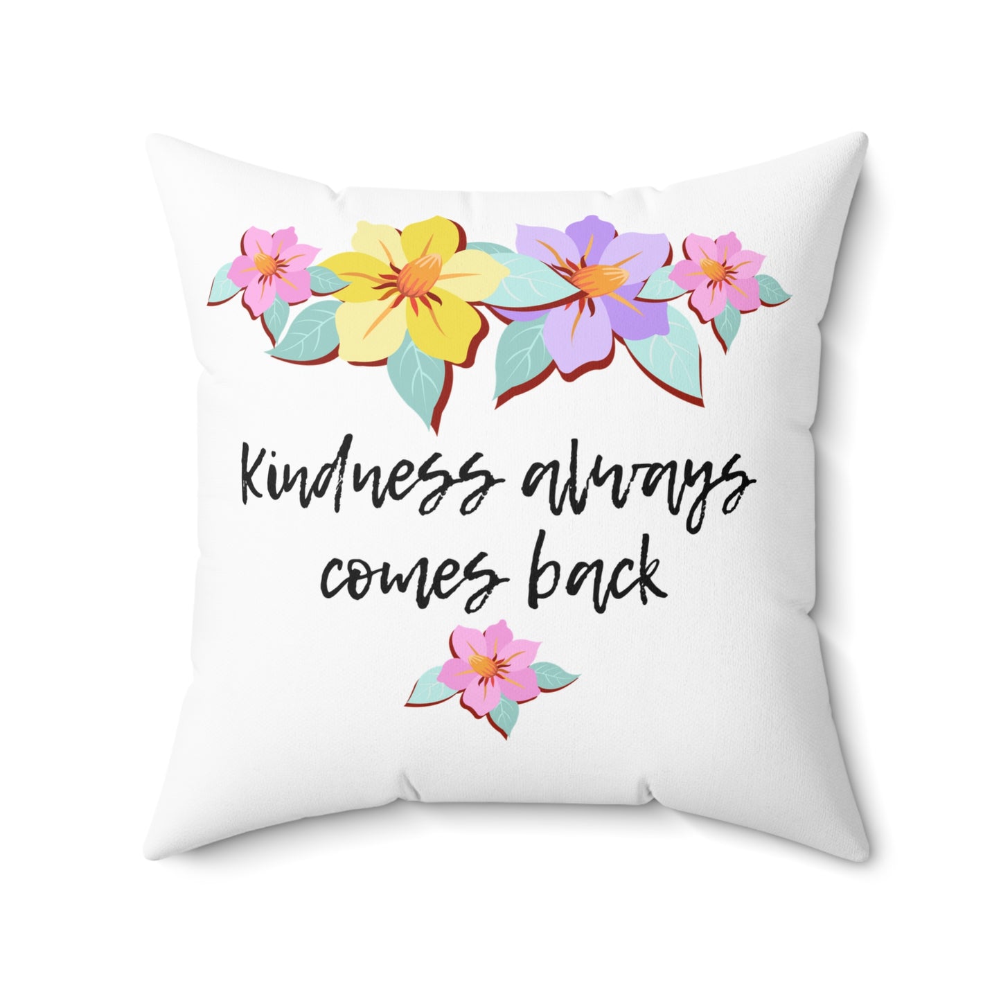 Almohada motivacional blanca con motivo de flores y cita inspiradora "La bondad siempre vuelve"